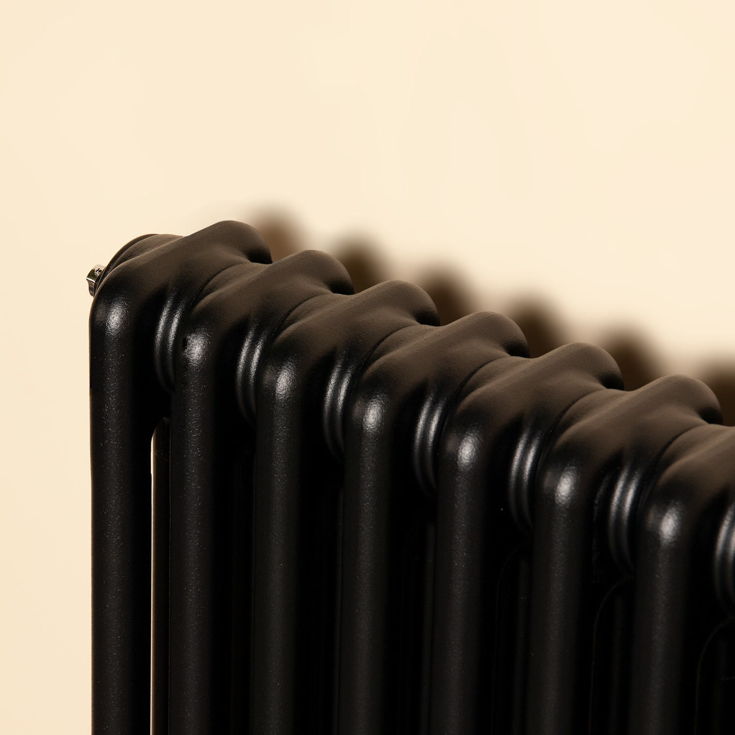 Black column radiator close up
